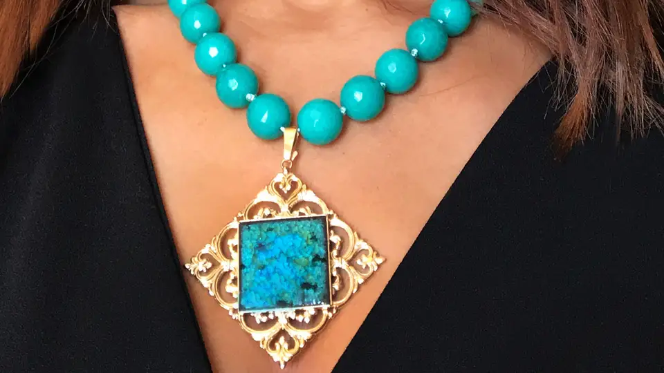 Lava stone necklace with pure gold decoration