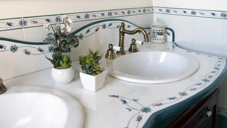 Bathroom with lava stone vanity top Bathroom vanity top in ceramicised lava stone hand decorated in Giarre and Caltagirone