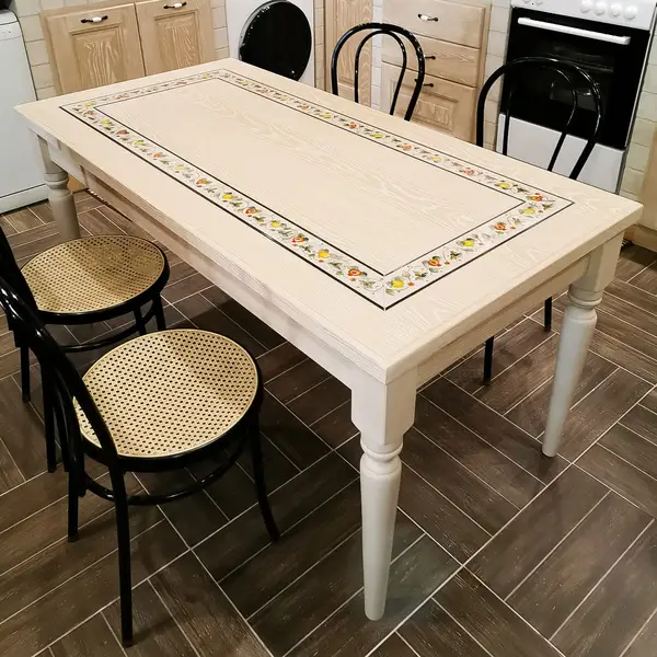 Wooden table with decorated stone insert Wooden table with decorated lava stone insert