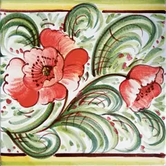 Decorated tile with large red flowers and curved green leaves on a light background with green and yellow borders