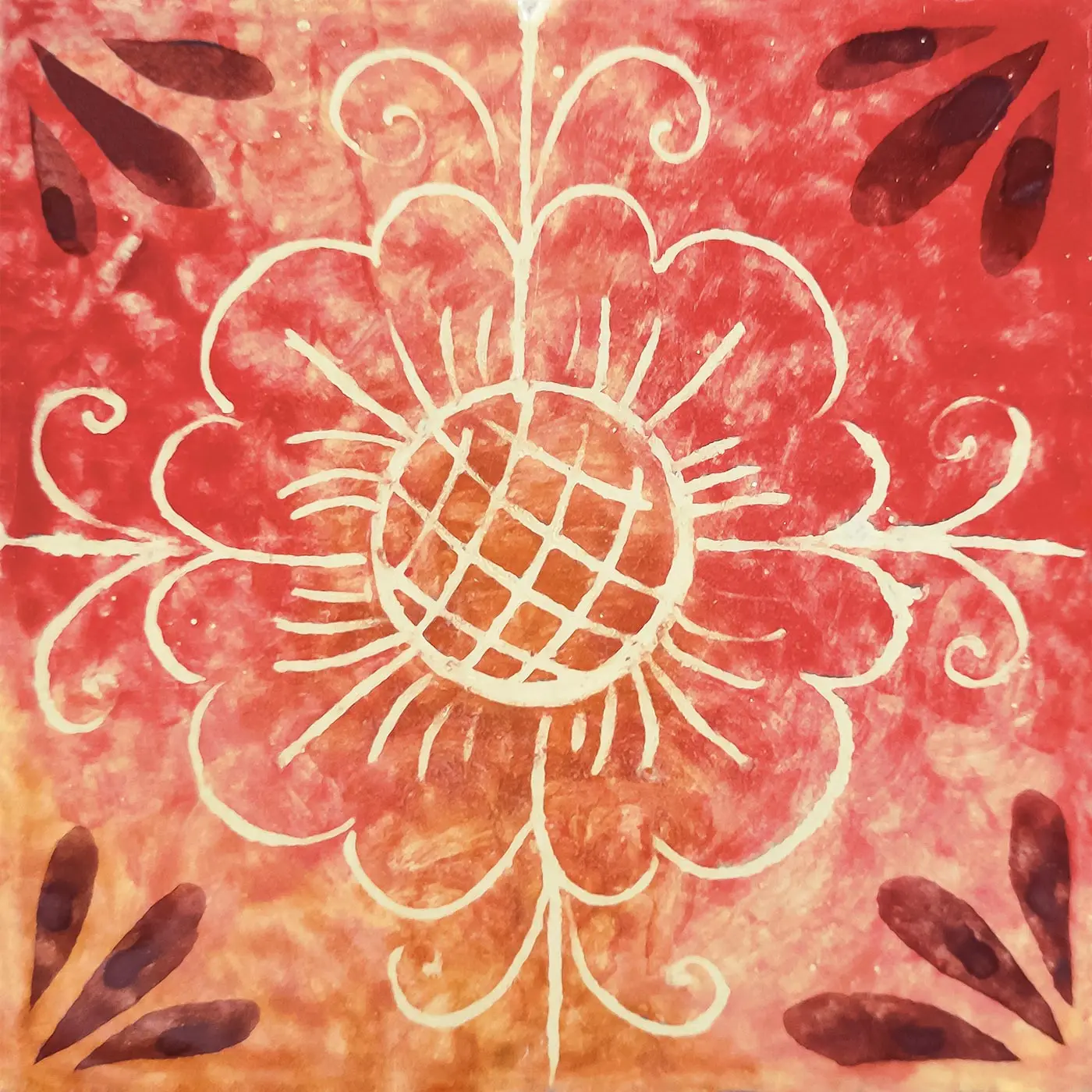Decorated tile with a large white-outlined flower with a lattice centre, pale scrolls and dark leaves in the corners on red