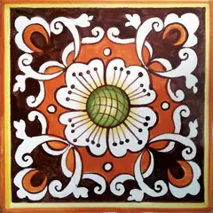 Decorated tile with a white flower with a green centre, white scrolls and orange shapes on brown with an ochre border