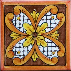 Decorated tile with a yellow flower and large ochre scrolls around white sections with a blue lattice on brown with an orange border