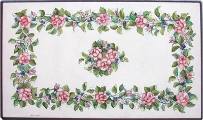 Mesa de piedra lávica pintada a mano con decoración de rosas rojas