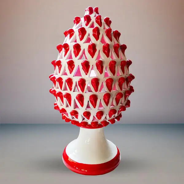 Pomme de pin en ceramique decoree a la main blanche et rouge avec lampe
