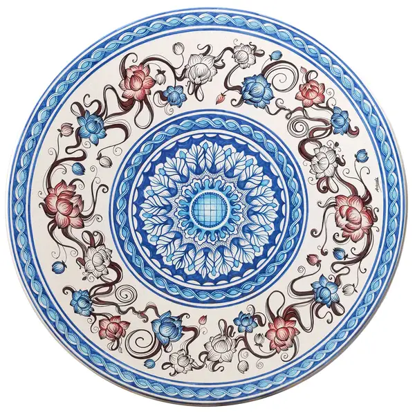 table en pierre de lave avec decor entrelacs floraux