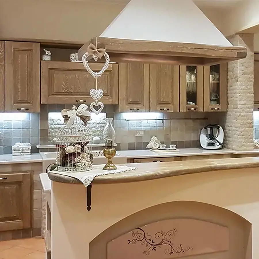 Artesole masonry-style kitchen with wood doors and decorated countertop Artesole masonry-style kitchen with wood doors and decorated countertop