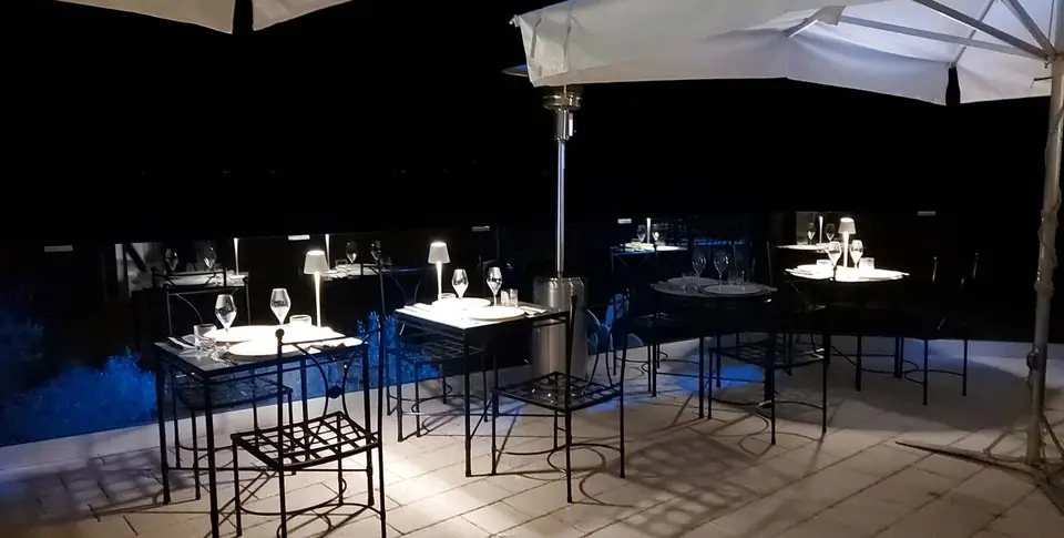 Restaurant tables in decorated lava stone