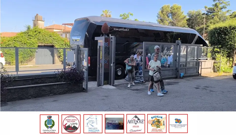 A group arrives by coach for the company visit. Visitors arriving by coach at the Artesole entrance