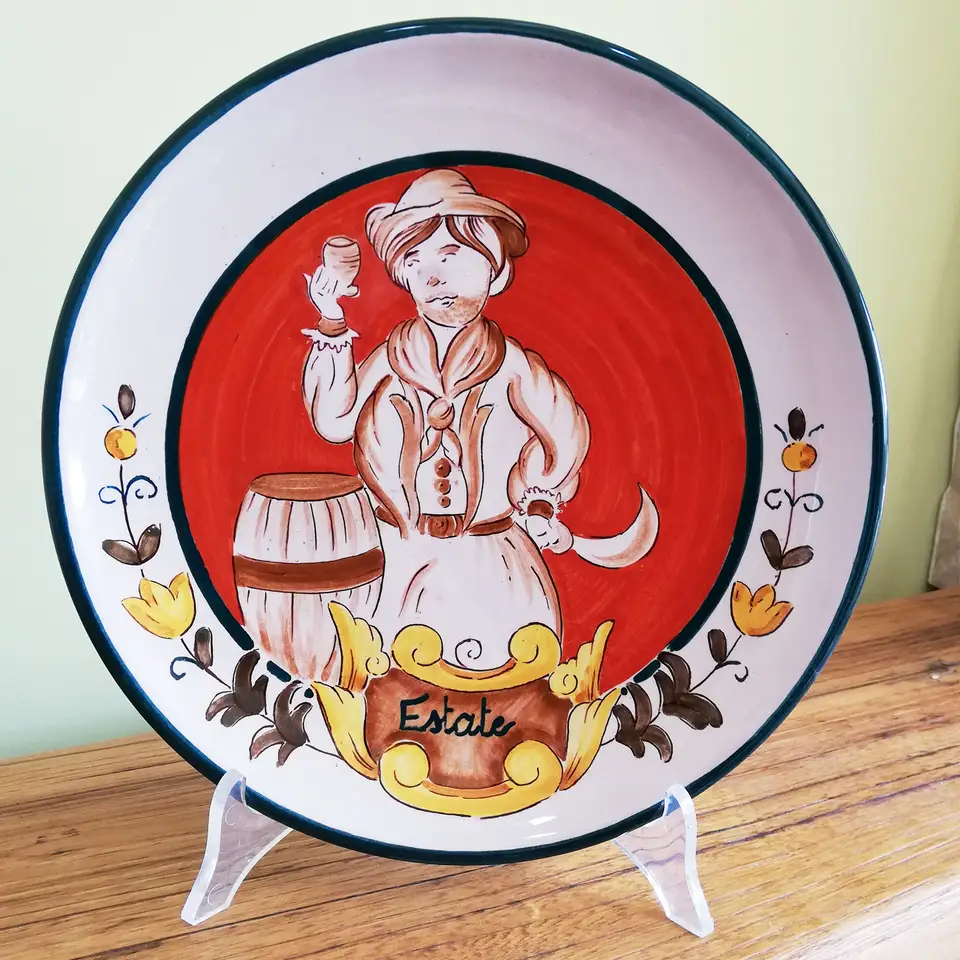 Hand-decorated ceramic hanging plate