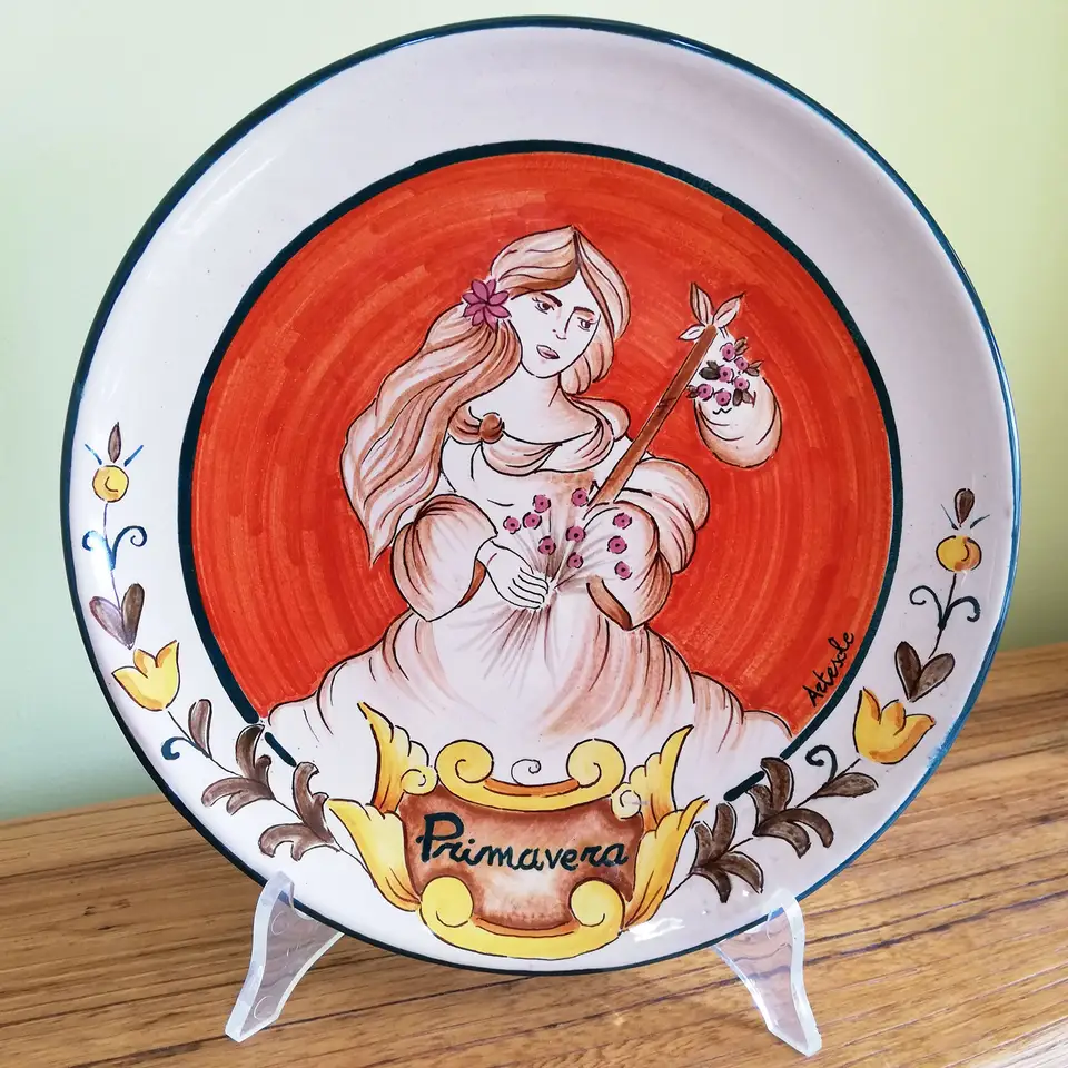 Hand-decorated ceramic hanging plate