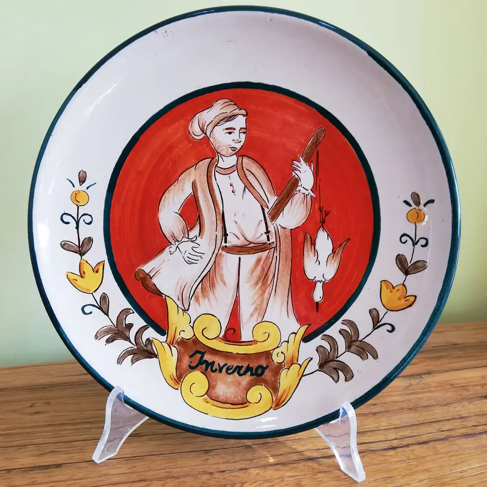 Hand-decorated ceramic hanging plate