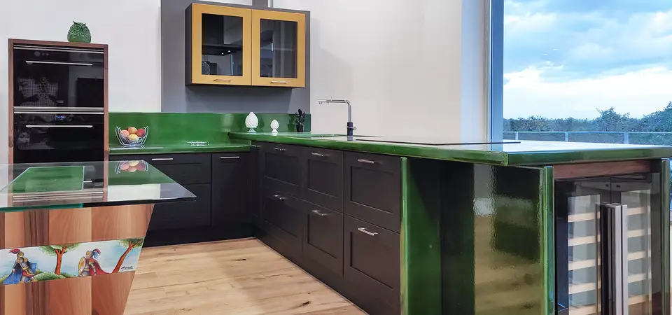 Corolla kitchen: dark cabinet doors Corolla modern modular kitchen with dark cabinet doors and a green ceramicized lava stone countertop