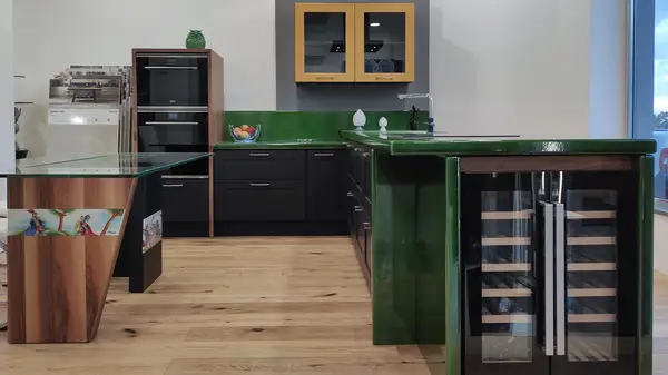 Corolla kitchen: peninsula with a wine cooler Corolla modern modular kitchen: peninsula with a wine cooler and wooden oven column