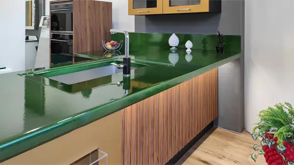 Corolla kitchen: green lava stone countertop, 5 cm thick Corolla kitchen: green lava stone countertop, 5 cm thick, with an inset stainless steel sink