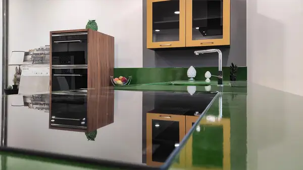 Corolla kitchen: cooking area Corolla kitchen: cooking area with a green countertop and wooden oven column