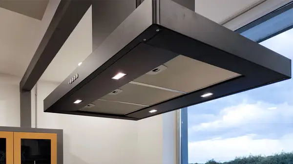 Corolla kitchen: detail of the black suspended hood Corolla kitchen: detail of the black suspended hood above the peninsula