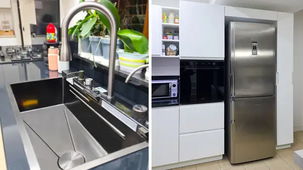 Trento kitchen: details of the stainless steel sink, oven column and fridge