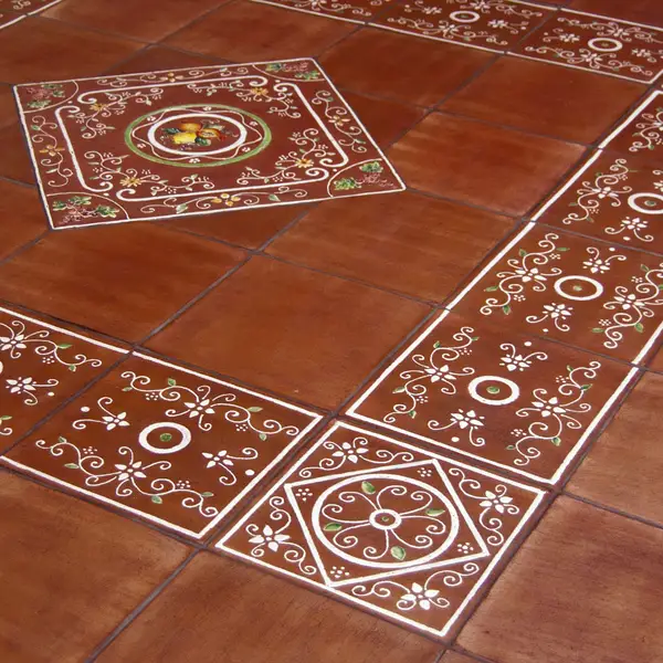 Hand-decorated lava stone or terracotta flooring