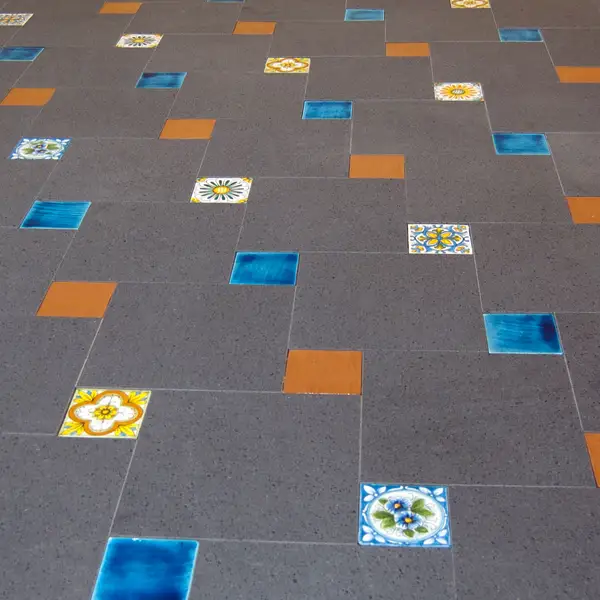 Hand-decorated lava stone or terracotta flooring