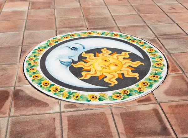 Hand-decorated lava stone or terracotta flooring