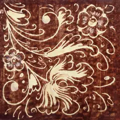 Decorated tile with white flowers, leaves and fine scrolls on a brown background