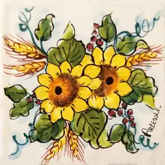 Decorated tile with two yellow sunflowers, large green leaves, wheat ears and small red fruits on a light background