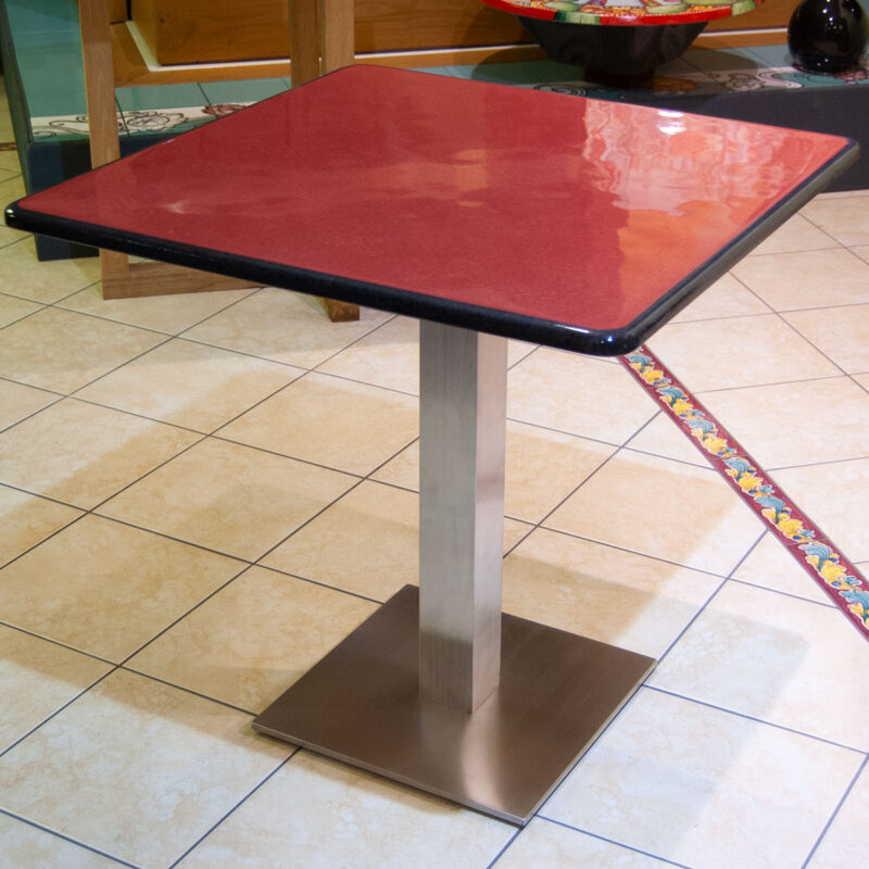 modern table with red lava stone top