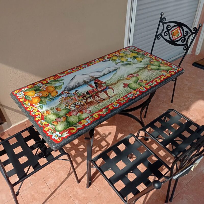 Rectangular lava stone table with Sicilian decorated foot