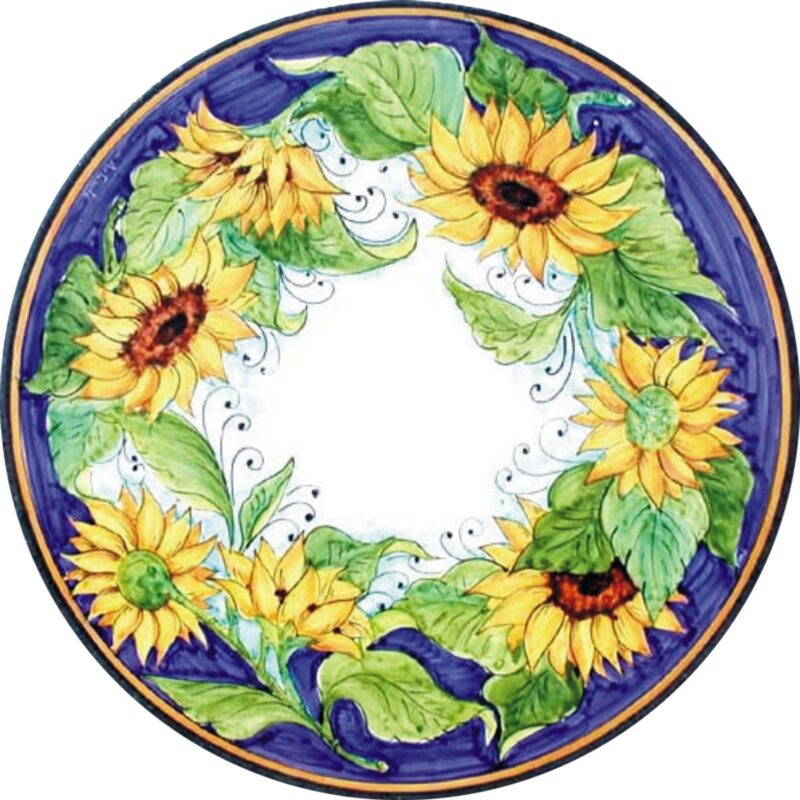 round lava stone table with sunflowers decoration and blue background