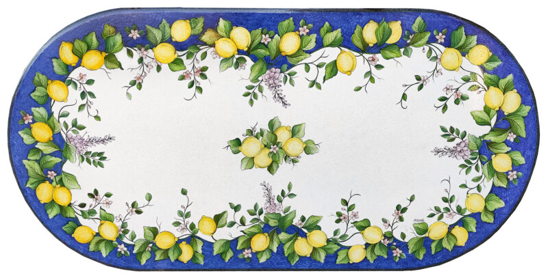 table in lava stone with lemons and wisteria decoration in blue