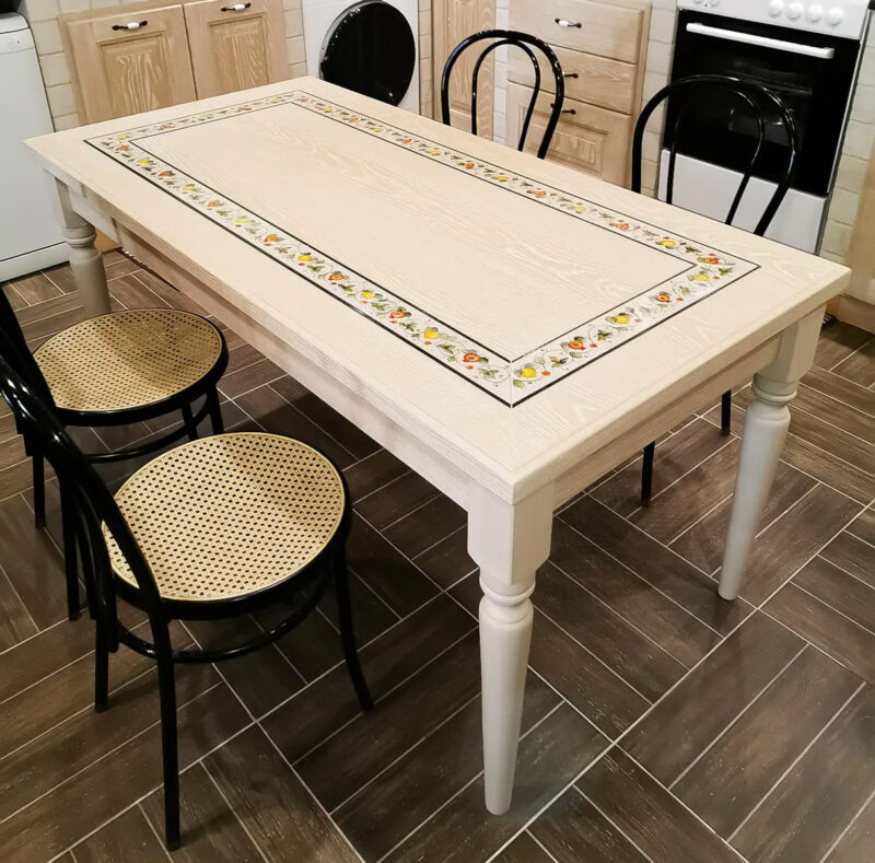 wooden table with decorated stone insert
